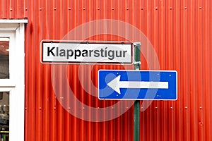A street sign with the word Klapparstigur on it is on a pole photo