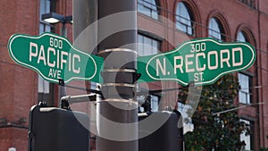 Street signs Pacific and Record in Downtown Dallas