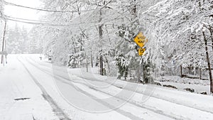 Street Signs on Snow covered road