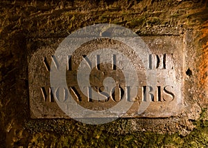 Street signs on the walls of the Catacombs of Paris, France