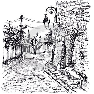 Street in small european old town with wall and lantern on it. Hand drawn sketch with ballpoint pen on paper texture. Isolated on