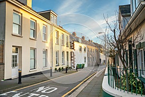 Street with small houses along the road, Belozanne, bailiwick of Jersey, Channel Islands