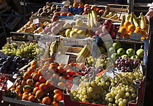 Street stall fruits. Wooden boxes with fruit inside