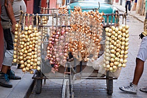 Street stall with garlic and onion strings