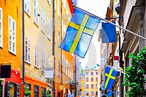 Street in Stockholm with swedish flags
