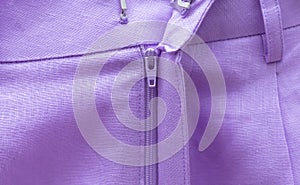 Street style fashion linen shorts close-up, classic summer style outfit, bright purple colors