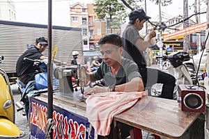 Street tailor in Ho Chi Minh city