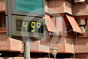 Street thermometer marking 49 degrees photo