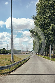 Street to nuclear power station old out of order germany nature tower sky plant rust fence closeup street art