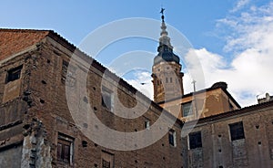 A street of the town of Calatayud, and in the background you can see one of the highest muderes towers photo