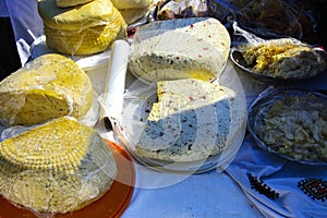Street trade in cheese at the holiday. Day of the city.