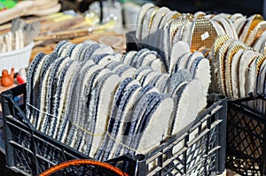 Street trade. Traditional fair. The counter with insoles for shoes.  Daytime. No people. Selective focus