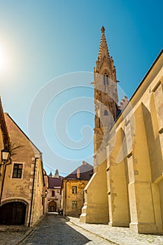 A street with traditional buildings in Bratislava, Slovakia.