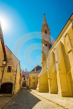 A street with traditional buildings in Bratislava, Slovakia.