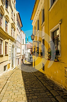 A street with traditional buildings in Bratislava, Slovakia.