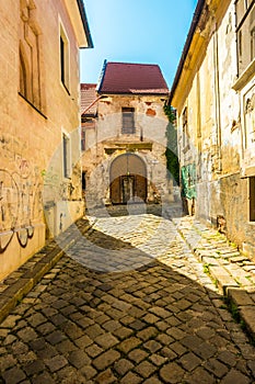 A street with traditional buildings in Bratislava, Slovakia.