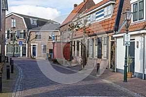 A street with typical houses in Spakenburg. The village has several harbors