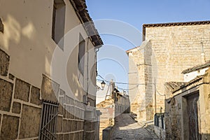 A street with typical old houses in Castrojeriz