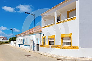 Street with typical Portuguese white houses in Sagres, the municipality of Vila do Bispo, southern Algarve of Portugal