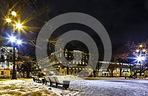 Street under snow cover, Saint Petersburg, Russia. Cityscape in winter night. Historical cultural building in baroque style