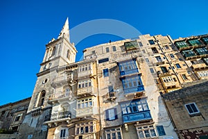 Street of Valletta with traditional balconies, Malta