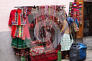 Street Vendor selling colorful clothing in La Paz, Bolivia