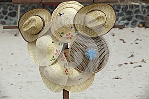 Street vendor selling straw hats