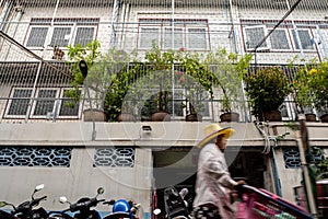 Street vendor walked hawking in the residential building