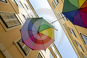 A street in Vienna with suspended umbrellas