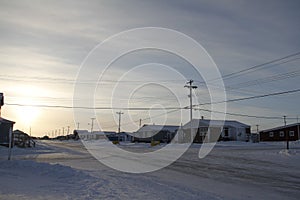 Street view of an arctic community and neighbourhood, located in Arviat