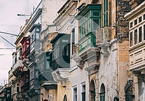 Street view in Birgu with traditional balconies, Malta