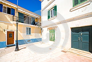 Street view with colorful old houses in Greece