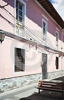 Street view of an old building facade, Latacunga, Ecuador photo