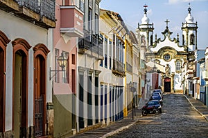 Street view of Sao Joao del Rei with Nossa Senhora do Carmo Church on backgound - Sao Joao Del Rei, Minas Gerais, Brazil