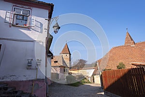 Street view in Sighisoara with the Butcher`s tower in sight