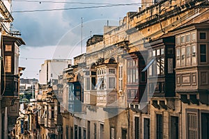 Street view in Sliema, traditional balconies, Malta