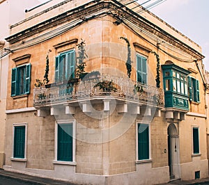 Street view in Sliema with traditional balconies, Malta