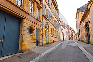 Street view and typical french buildings in Metz, France