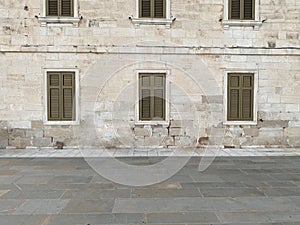 Street View of Wall With Shuttered Windows