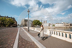 Street view with woman walking in Paris