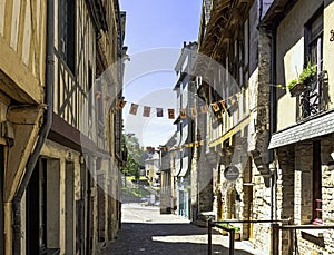 Street of Vitre Old Town with vintage architecture in Vitre, France