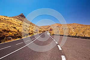 Street in vulcanic landscape of Fuerteventura Island, Canary Island, Spain, Europe.