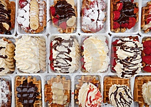 Street Waffles Decorated with Strawberries Chocolates and Cream in Brussels of Belgium