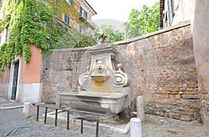 Street water fountain Rome Italy