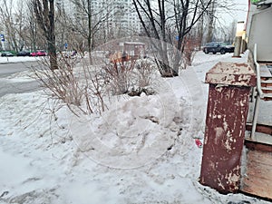 A street in winter with broken steps