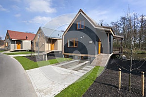 Street with wooden vacation houses in Reeuwijk