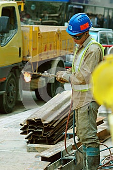 Strade lavoratore torcia 