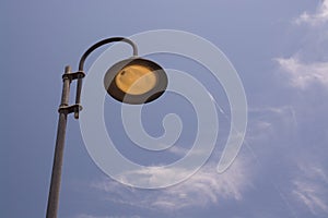 Streetlamp on blue sky