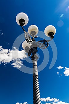 Streetlamp in Florence blue sky