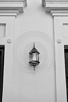 streetlamp lantern on house wall. streetlamp lantern outdoor. photo of streetlamp lantern